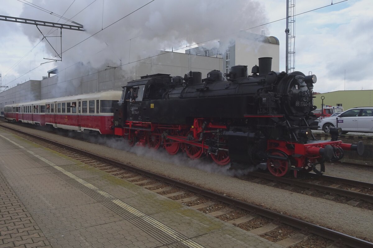 Steam on STEAM-53 with 86 1774 hauling an extra train out of Benesov u Prahy on 11 September 2022.