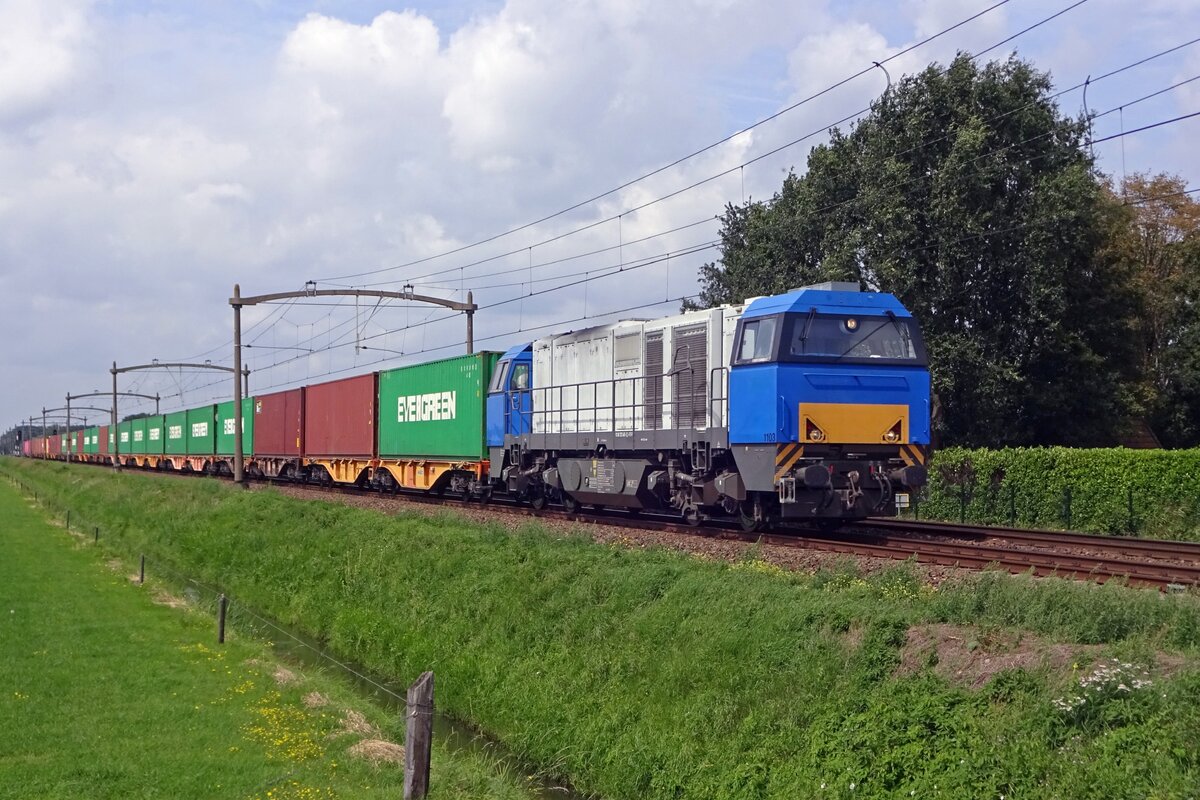 Stripeless RRF 1103 hauls a container train through Hulten on 16 August 2019.