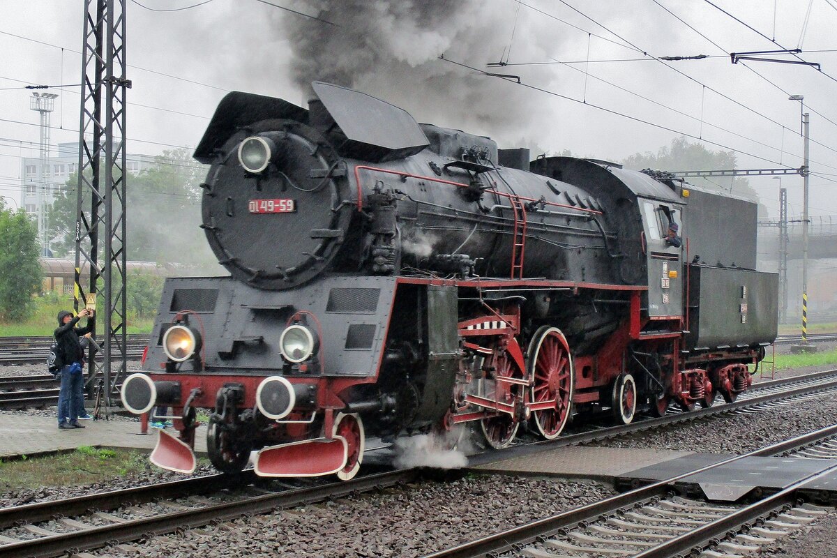 Taking part in the Czech National Railways Day activities, PKP Ol 49-59 runs light through Bohumín during a soaking wet 23rd September 2017.