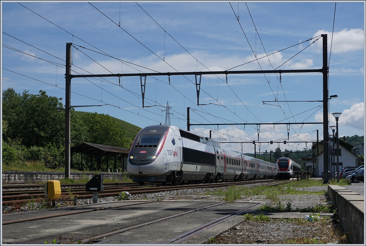 TGV Lyria to Paris in La Plaine. 20.6.2016 - Rail-pictures.com