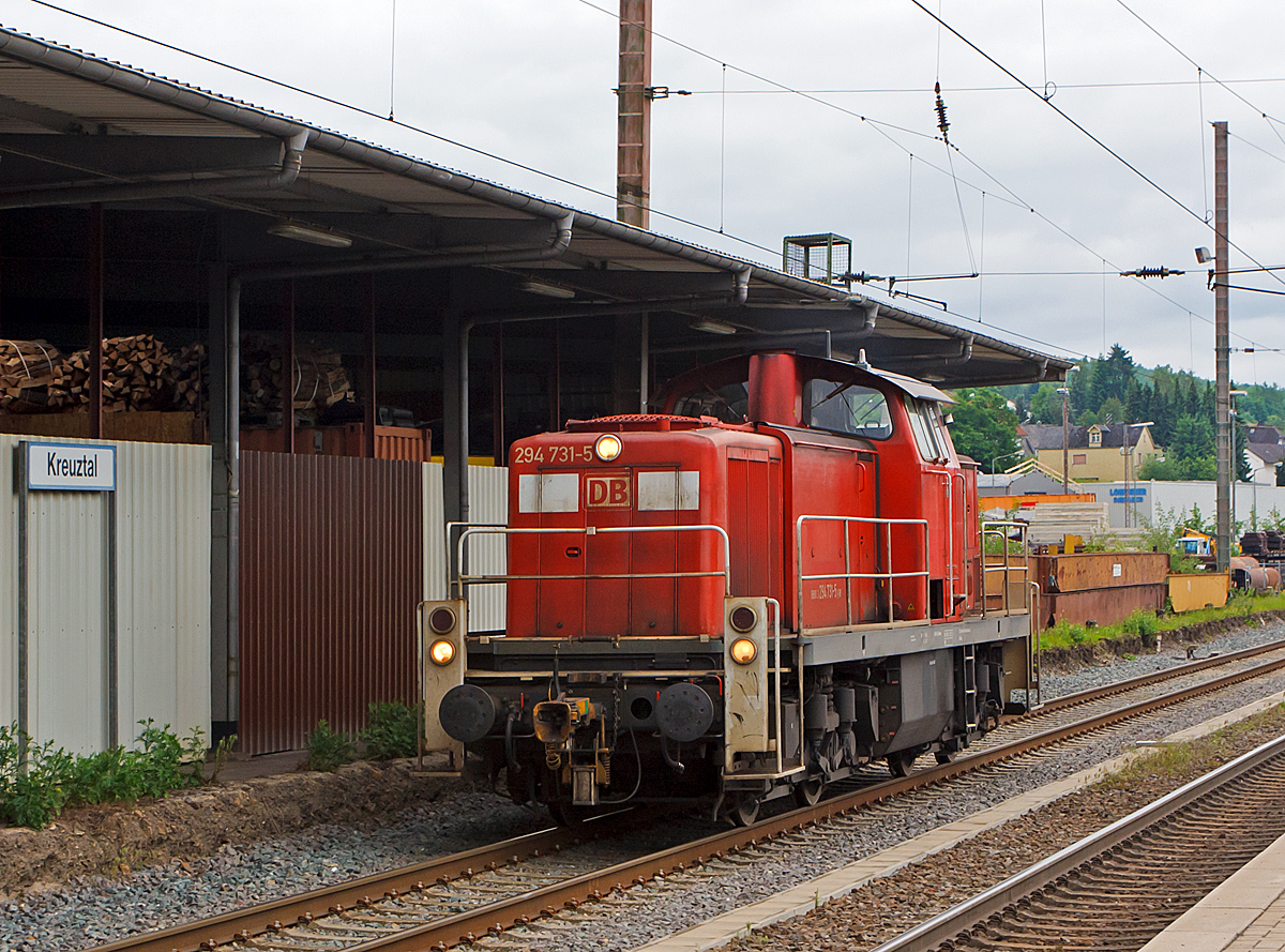 
The 294 731-5 (V90 repowered), ex DB 294 231-6, ex DB 290231-0, of the DB Schenker Rail Germany AG runs on 30.05.2014 by the station Kreuztal station.