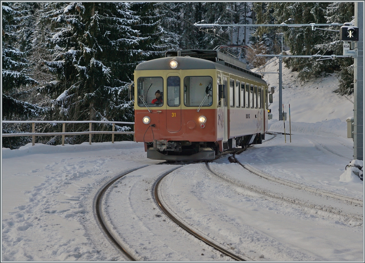 The BLM Be 4/4 N° 31  Lisi  (ex asm) is provided in Grütschalp. The BLM, which runs at a fairly high altitude, is still in the shadow of the Jungfrau. January 16, 2024