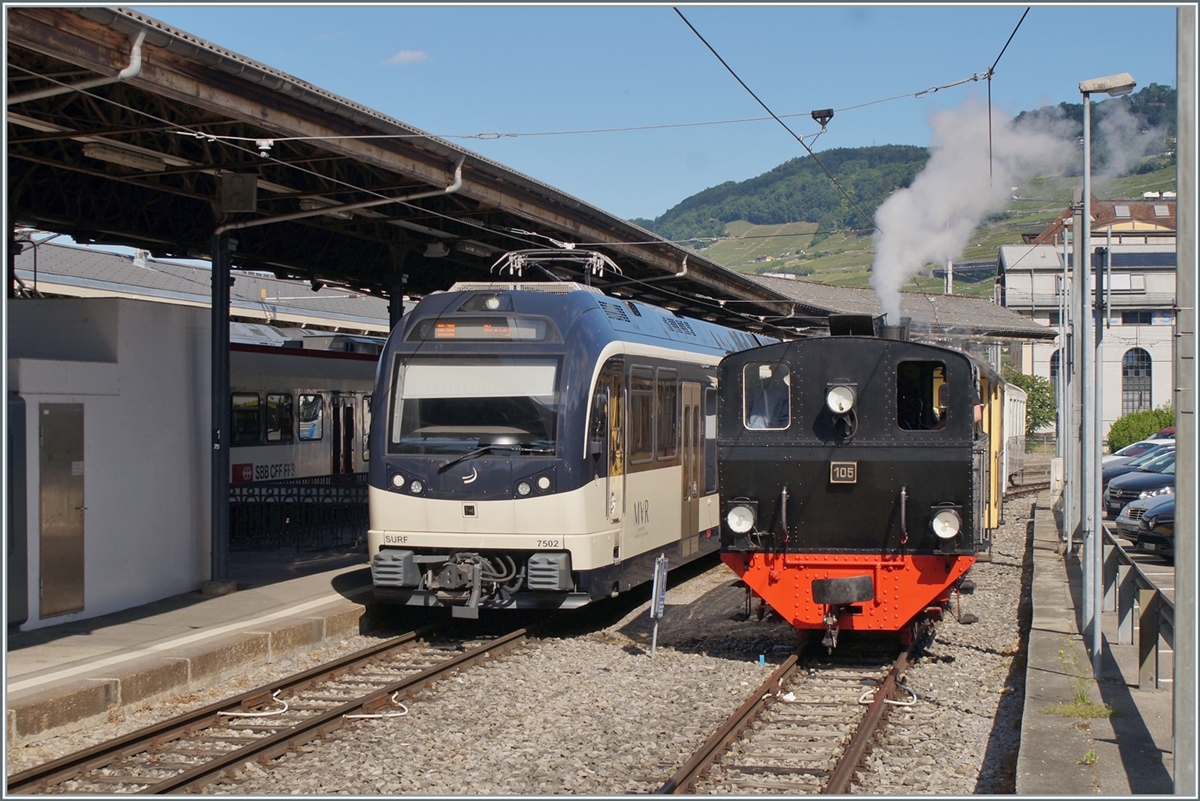 The Blonay-Chamby G 2x 2/2 105 and CEV MVR ABeh 2/6 7502 in Vevey. 

29.05.2022