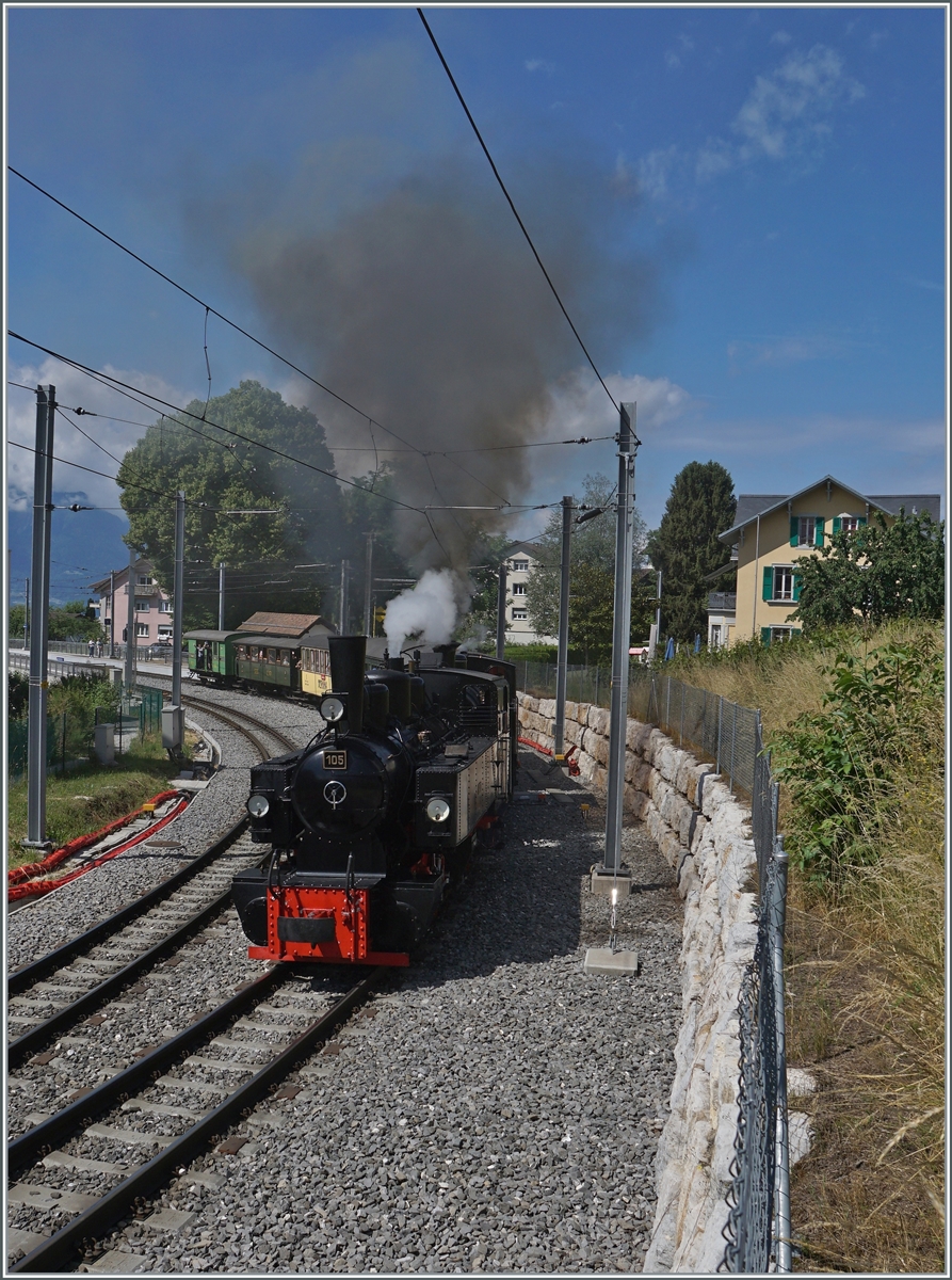 The Blonay-Chamby Steamer G 2x 2/2 105 and HG 3/4 N° 3 in St Légier Station on the way from Vevey to Chaulin. 

06.06.2022
