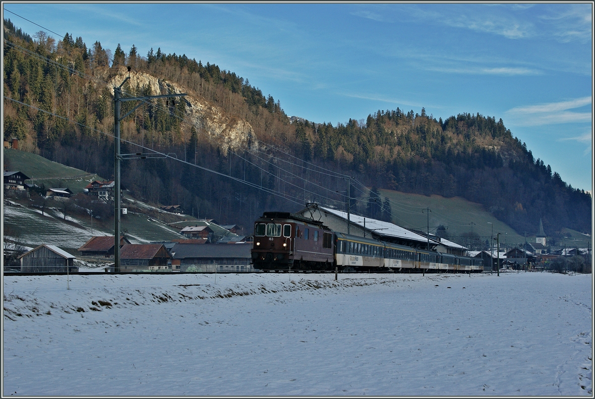 The BLS re 4/4 163 wit an  Goldenpass  IR to Zweisimmen by Boltigen. 
05.12.2013