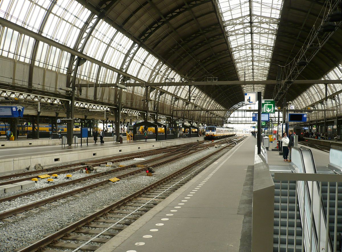 The building of the new wider tunnel under the tracks has finished. 
Track 11, 12 and 13 Amsterdam Centraal Station 18-06-2014. 