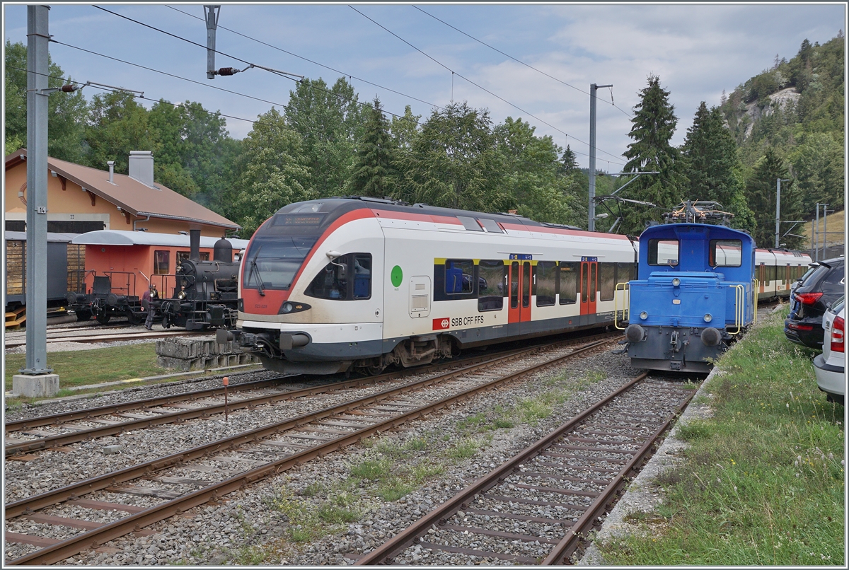 The CTVJ (Compagnie du Train a vapeur de la Vallée de Joux) E 3/3 8494-6 (UIC 90 85 0008 494-6), the SBB RABe 523 025 and the CTVJ (Compagnie du Train a vapeur de la Vallée de Joux) Tem 221 208 in Le Pont. 23.07.2023

