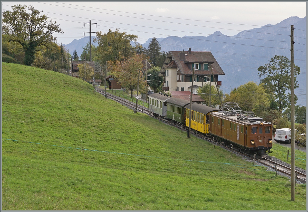  The DER de la Saison 2023  - the Bernina Bahn Rhb Ge 4/4 81 of the Blonay-Chamby Bahn with the  Velours  Express from Chaulin to Vevey is also at Cornaux. The Cornaux stop can be seen right behind the train.

Oct 29, 2023