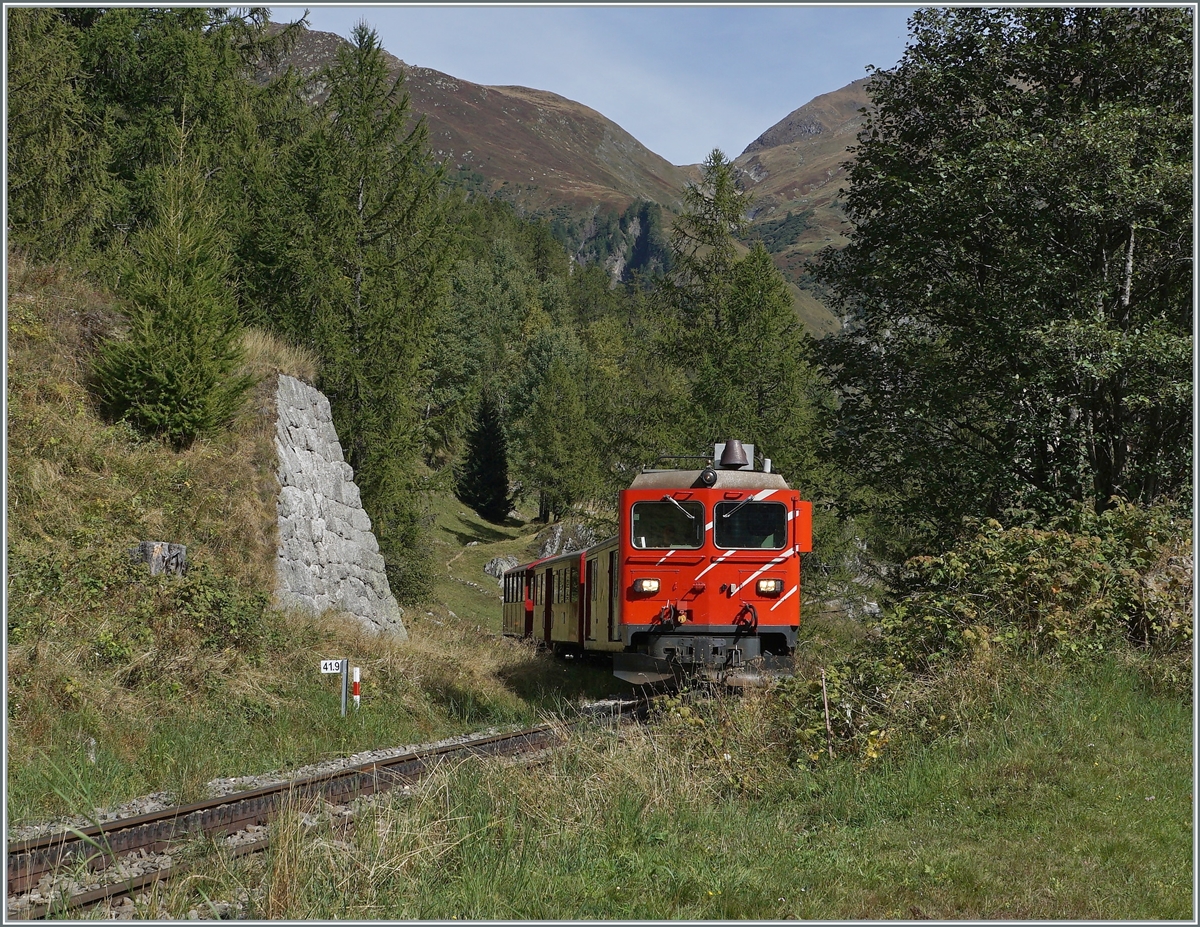 The DFB MGB HGm 4/4 61 by Oberwald on the way to Gletsch. 

30.09.2021