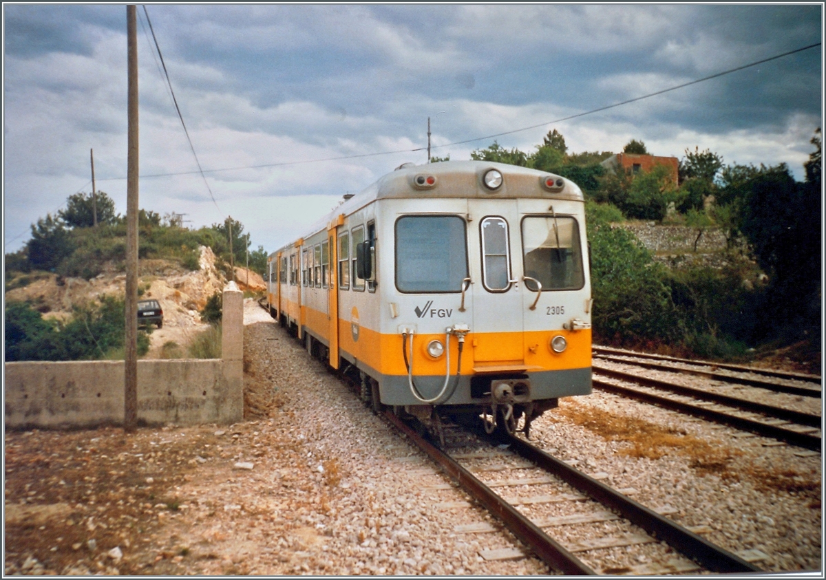 The FGV diesel multiple unit 2306 is on its way from Alicante to Denia and leaves the Calp/Calpe train station after a short stop.

May 1993
