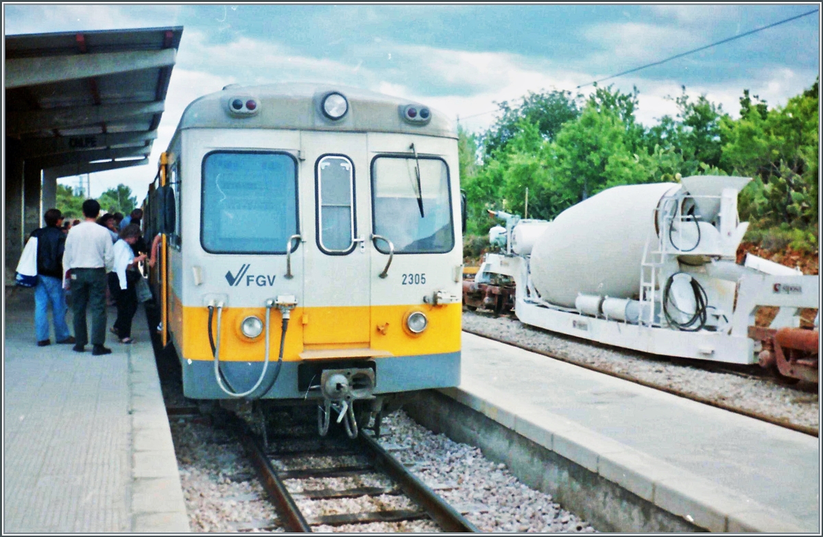 The FGV (Ferrocarrils de la Generalitats Valenciana) operates various regional routes in the region of Valencia and Alicante, since August 15, 2003 as a light rail (tram). The picture shows the situation before the changeover: The FGV railcars 2306 and 2305 are on the journey from Alicante to Denia and has arrived in Calp / Calpe. 

Analog image from May 1993 