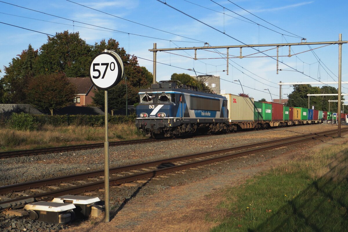 The former Bentheimer Eisenbahn Coevorden container shuttle train passes through Wijchen with TCS 101002 at the reins on 16 October 2021.