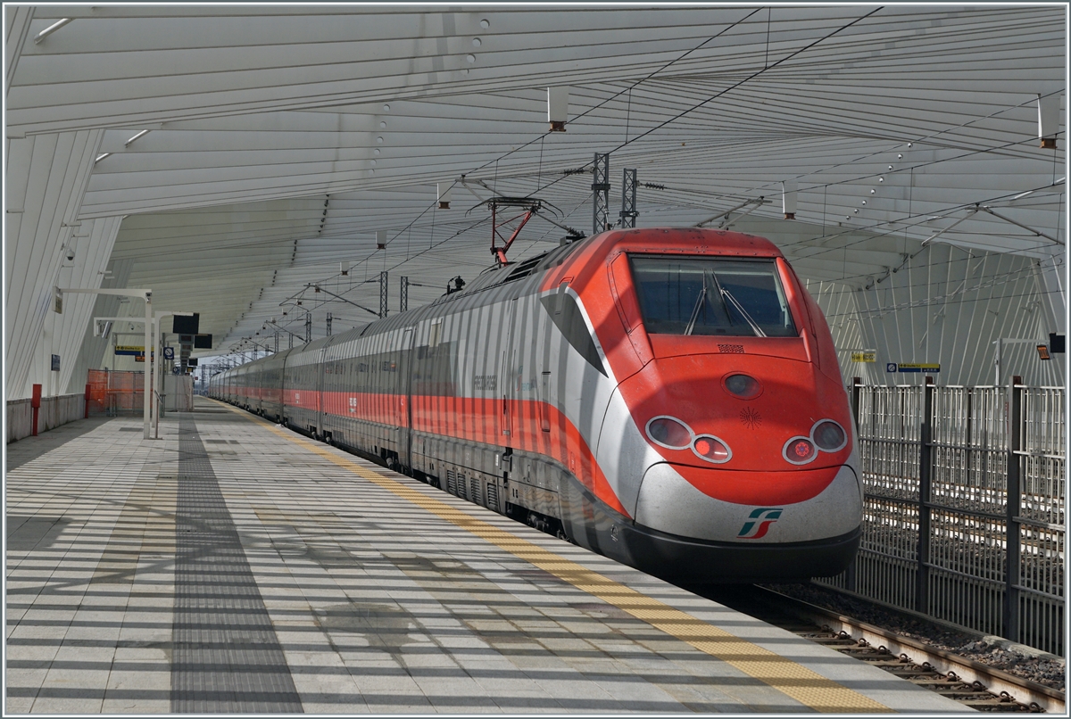 The FS Trenitalia ETR 500 044 Frecciarossa on the way to Milano Centrale by his stop in Reggio Emilia AV. 

14.03.2023