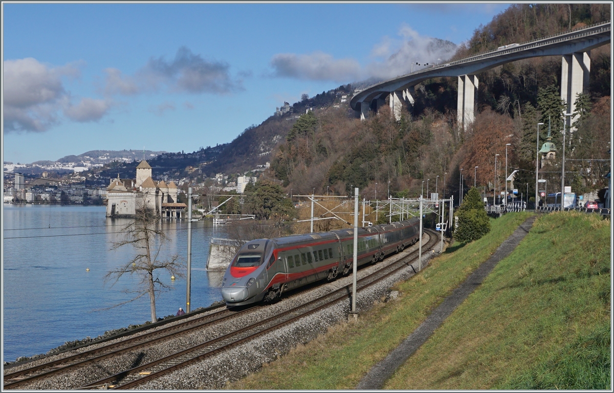 The FS Trenitalia ETR 610 012 is the EC 32 on the way from Milano to Geneva by the Chastle of Chillon. 

10.01.2022