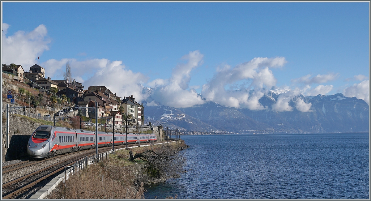 The FS Trenitalia ETR 610 012 between Rivaz and St Saphorin on the way to Milano. 

10.01.2022