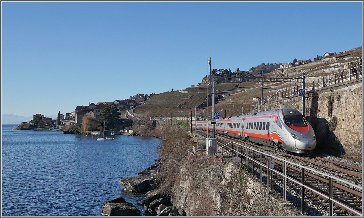 The FS Trenitalia ETR 610 012 between Rivaz and St Saphorin on the way to Milano. 

10.01.2022
