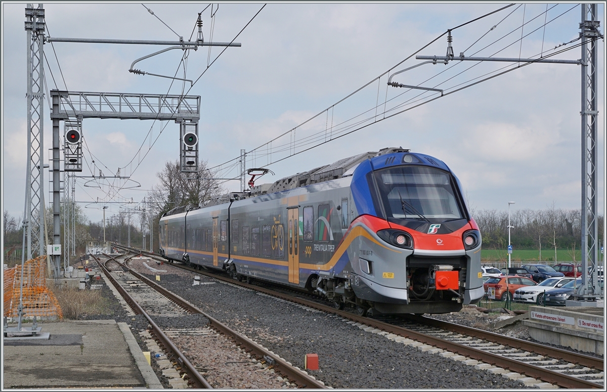 The FS Trenitalia TPER ETR 103 024 leaves Reggio Mediopanda station as regional train 90180 from Reggio Emilia to Guastalla. 

March 14, 2023