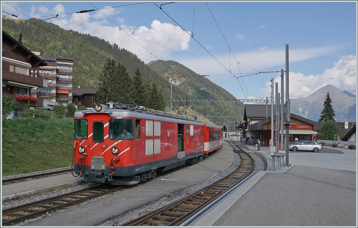 The MGB Deh 4/4 23 with a local train to Andermatt by his stop in Sedrun. 

16.09.2020