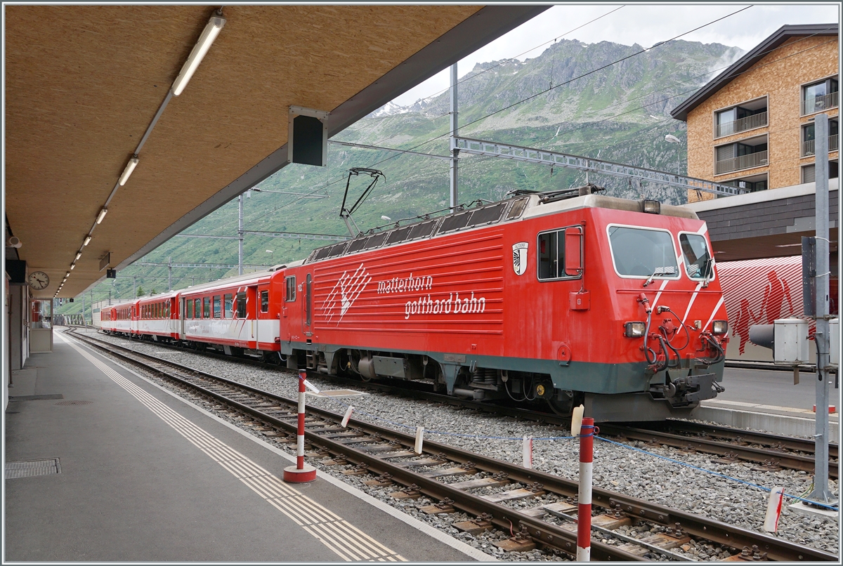 The MGB HGe 4/4 102 wiht a local train to Disentis in Andermatt. 

23.06.2021