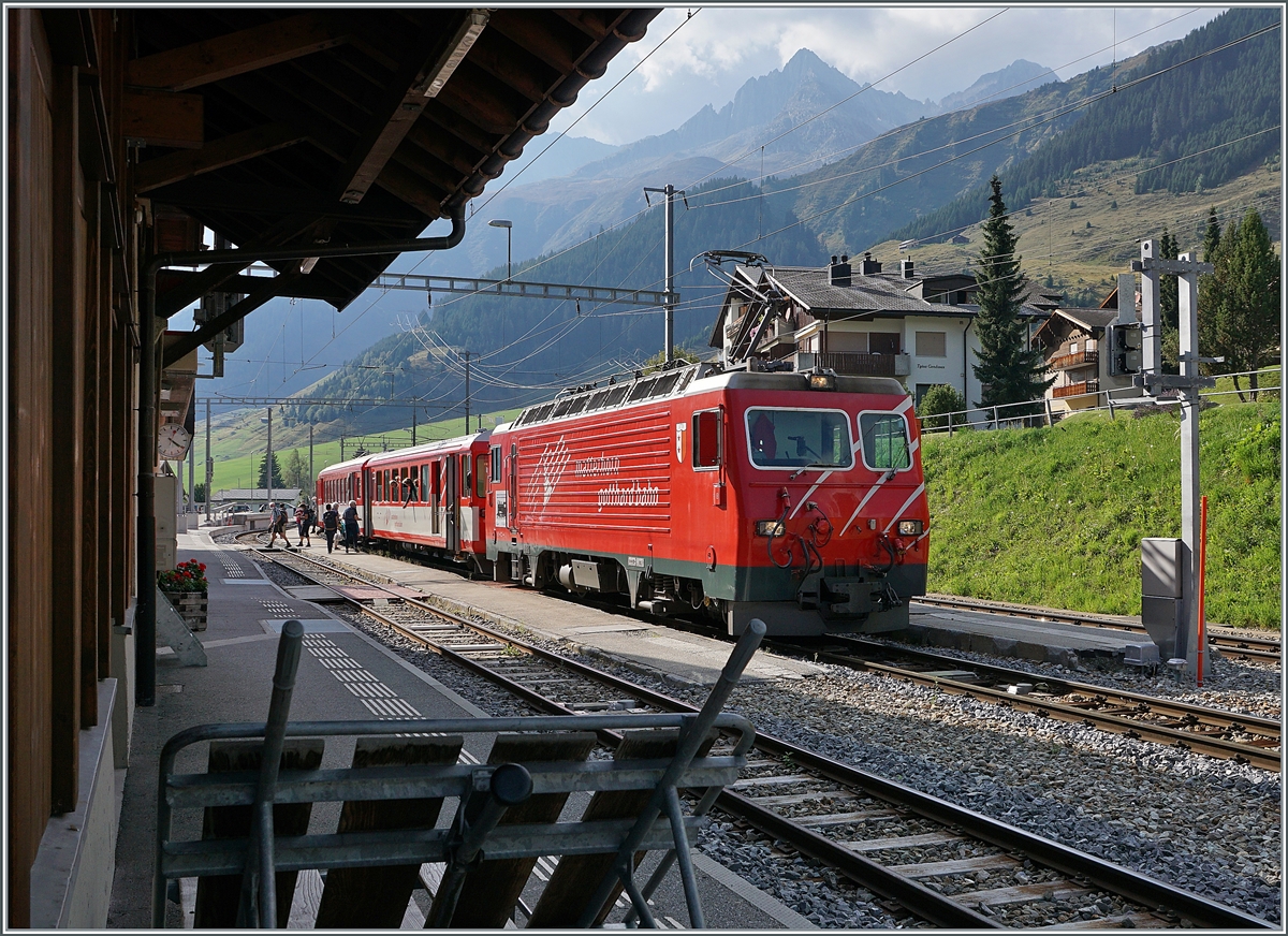 The MGB HGe 4/4 11 is arriving with his local service from Andermatt to Disentis at the Serdrun Station. 

16.09.2020