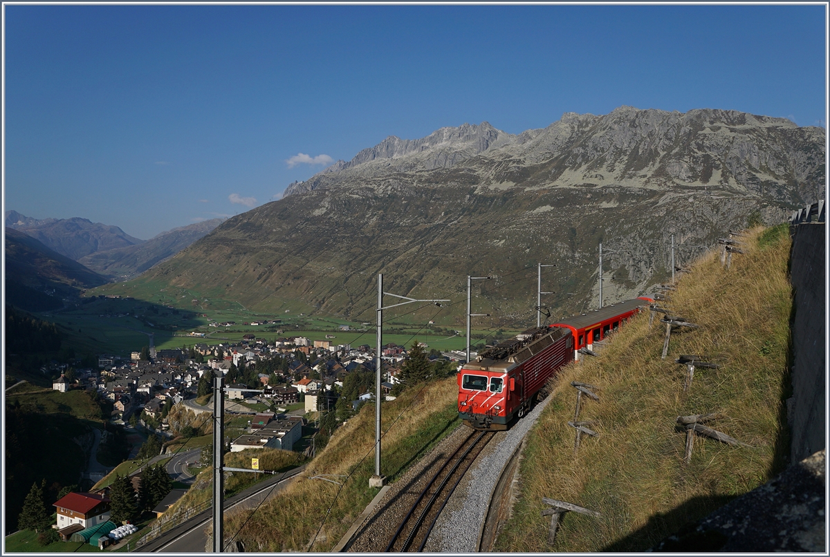 The MGB HGe 4/4 II N° 108 with his local train  from Distenis is west side of the Oberalp on the way to his destination down in the glen: Andermatt.

17.09.2020