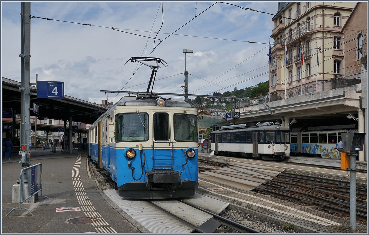 The MOB ABDe 8/8 4002  VAUD  and in te background the Be 4/4 (ex SNB) in Montreux. 19.08.2019