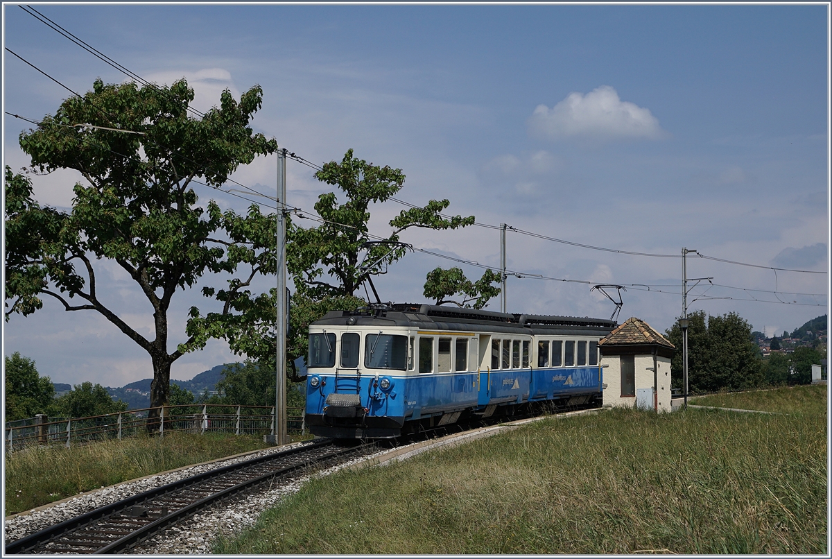 The MOB ABDe 8/8 4004 FRIBOURG by his stop at the Châtelard VD Station. 
08.08.2018 