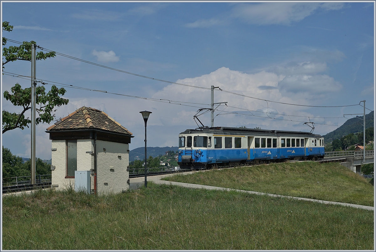 The MOB ABDe 8/8 4004 FRIBOURG is leaving the Châtelard VD Station. 08.08.2018