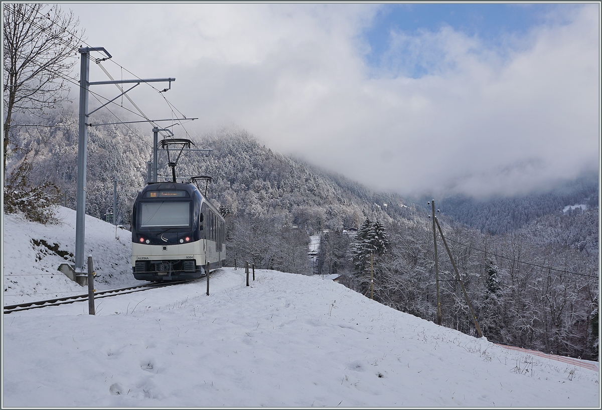 The MOB Alpina Be 4/4 9204 and ABe 9304 wiht his  B  are the local MOB service 2220 from Montreux to Zweisimmen pictured by Les Avants. 02.12.2020