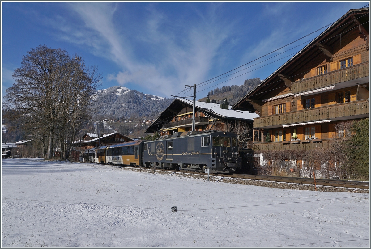 The MOB GDe 4/4 6002 with his PE 2122 GoldenPass MOB Panoramic on the way to Zweisimmen Montreux by Saanen. 

03.12.2020