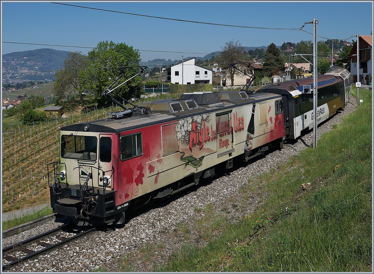 The MOB Ge 4/4 6006 with a MOB Panoramic Express on the way from Zweisimmen to Montreux by Planchamp. 04.05.2020