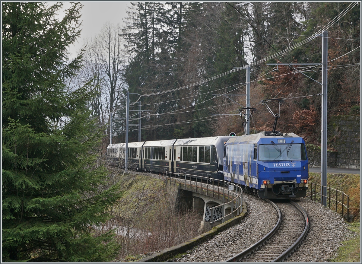 The MOB Ge 4/4 8001 with the MOB GoldenPass Express 4065 on the way from Interlaken Ost to Montreux near Sendy-Sollards. 

04.01.2023