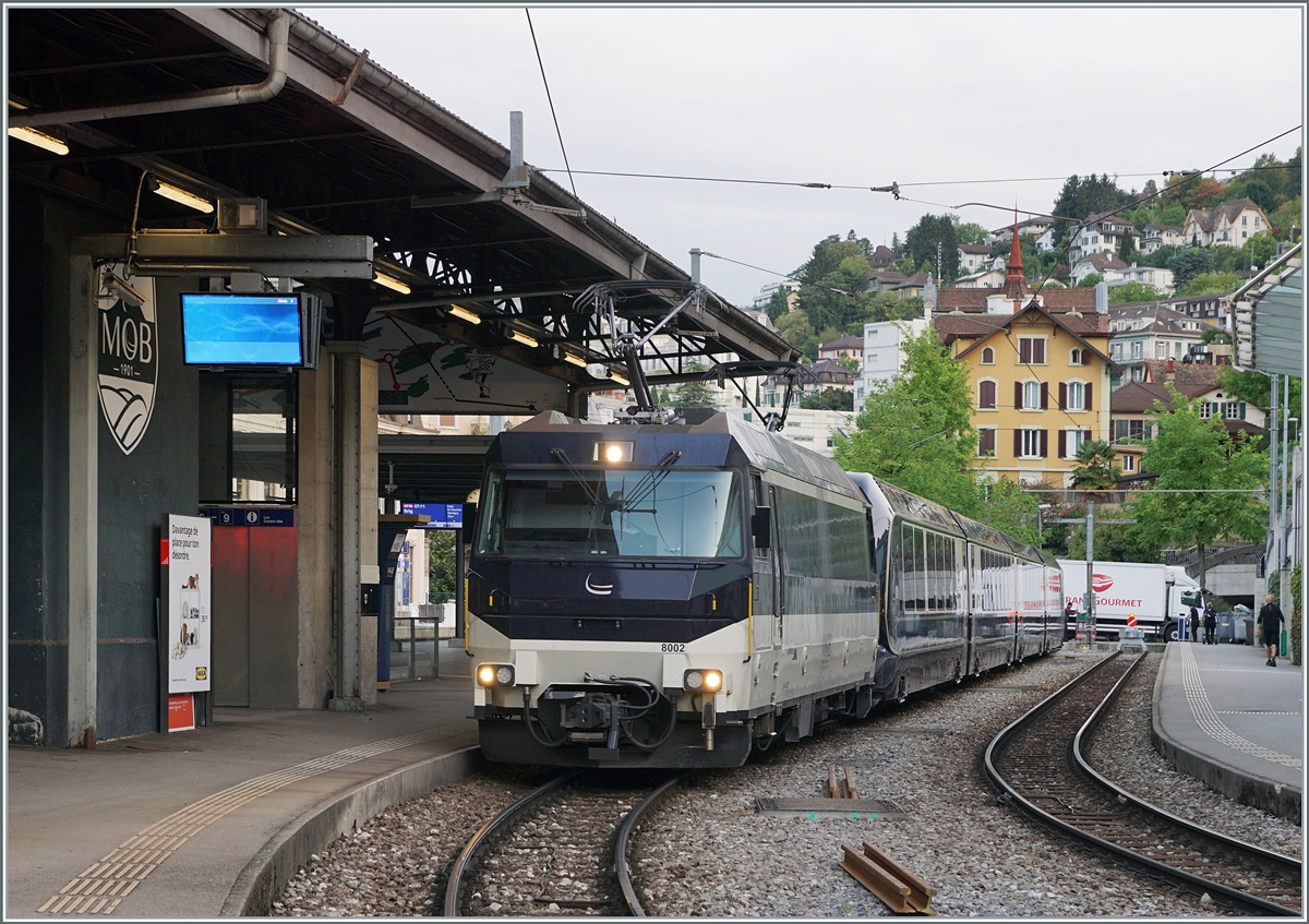 The MOB Ge 4/4 8002 with its GoldenPass Express GPX 4064 is waiting in Montreux for its imminent departure to Interlaken Ost.

August 30, 2023