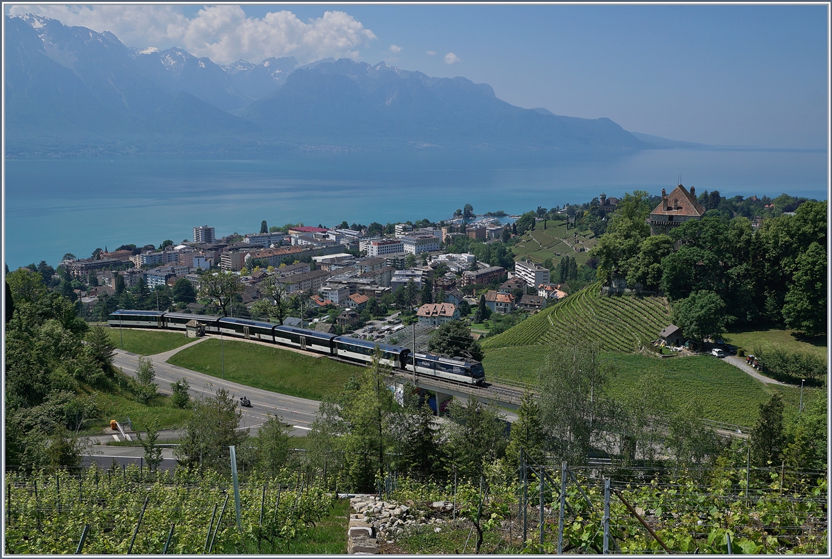 The MOB Ge 4/4 8004 with a MOB Golden Pass Panoramic Express on the way to Zweisimmen by Le Châtelard VD.

18.05.2020