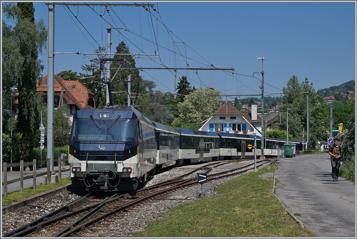The MOB Ge 4/4 8004 wiht a Golden Pass Panoramic Express on the way to Montreux in Fontanivent. 

18.05.2020.