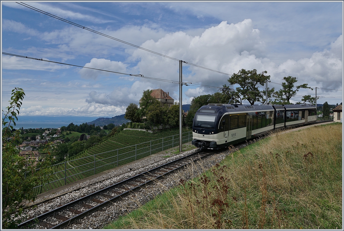 The MVR ABeh 2/6 7503  Blonay-Chamby  and a view over the lake by Châtelerd VD. 

12. Aug. 2019