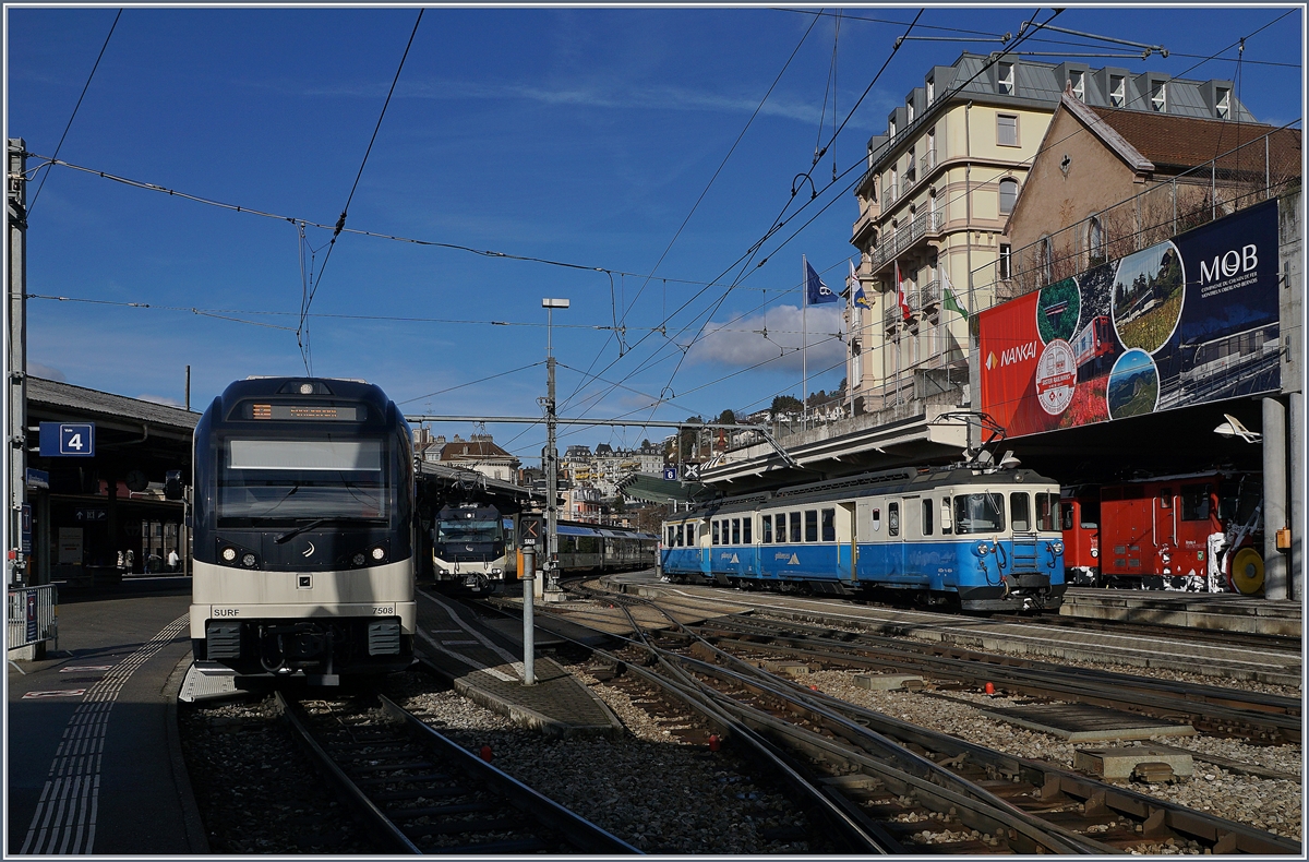 The MVR ABeh 2/6 7508, a MOB Ge 4/4 (Serie 8000) and the MOB ABDe 8/8 4004 FRIBOURG in Montreux.
18.01.2018