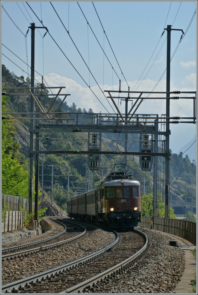 The old Ae 6/8 205 wiht his  Swiss Classic  Train is approching Hohtenn.
07.09.2013