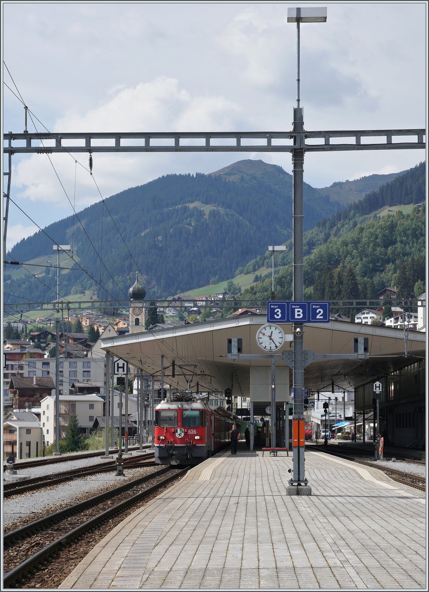 The RhB Ge 4/4 II 626 wiht a RE on the way to Chur in Disentis. 

16.09.2020