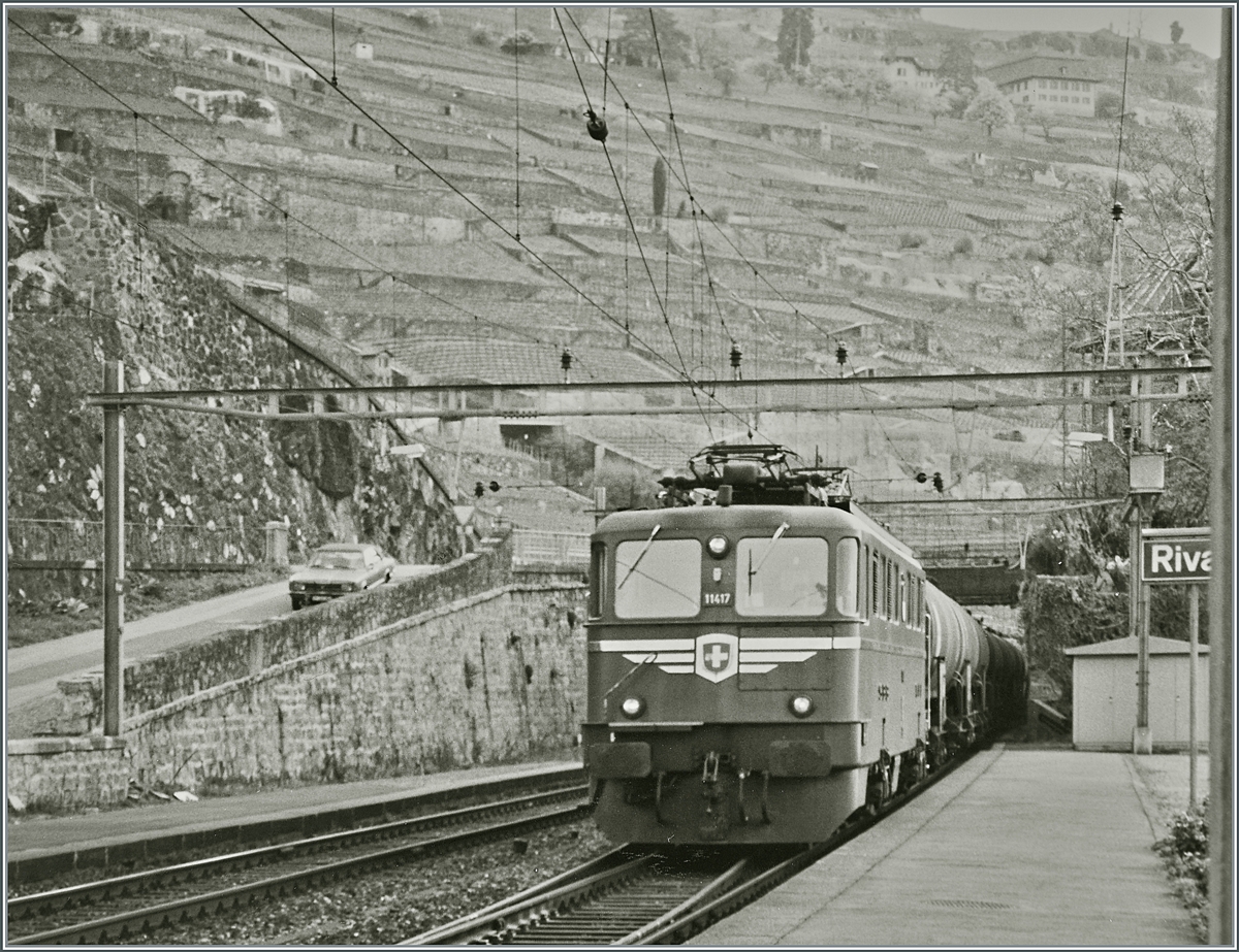The SBB Ae 6/6 11417 with Cargo Train by Rivaz. 

Analog picture from the spring 1995