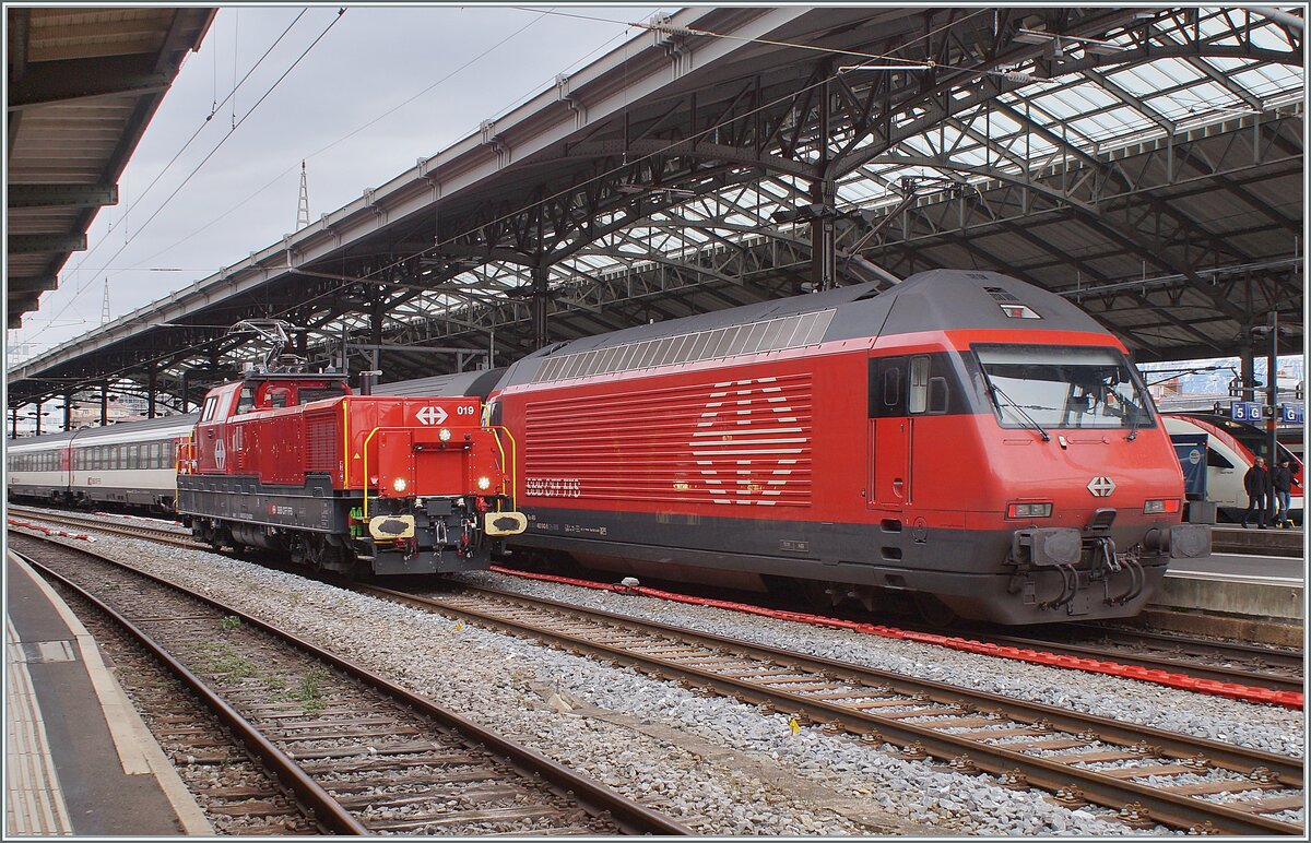 The SBB Aem 940 019 (Aem 91 85 4 940 019-3 CH-SBBI) and a SBB Re 460 in Lausanne. 20.01.2022