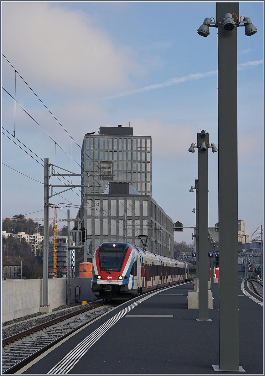 The SBB CFF LEX RABe 522 228  Léman Express  to Annemasse by his stop in Lancy Pont Rouge. 

21.01.2020