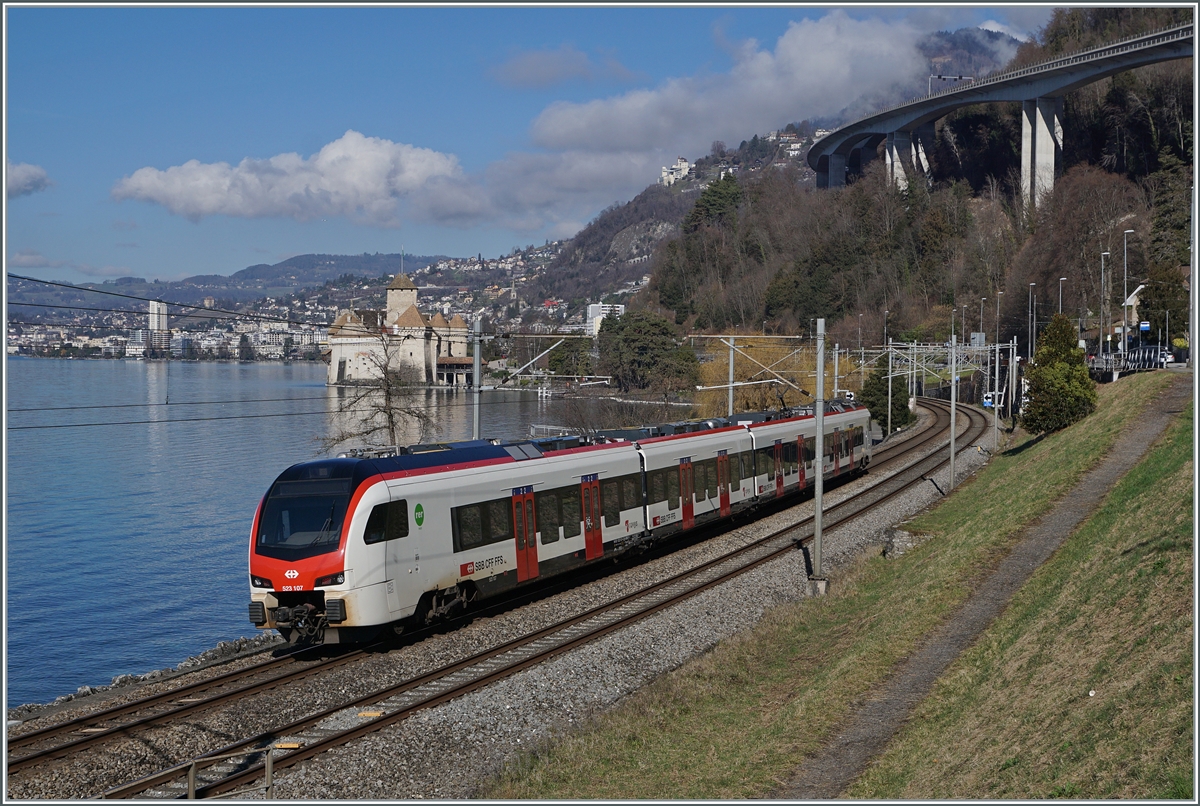 The SBB FLIRT3 RABe 523 107 is at Chillon Castle on the way from St Maurice to Vallorbe.

Feb 13, 2024