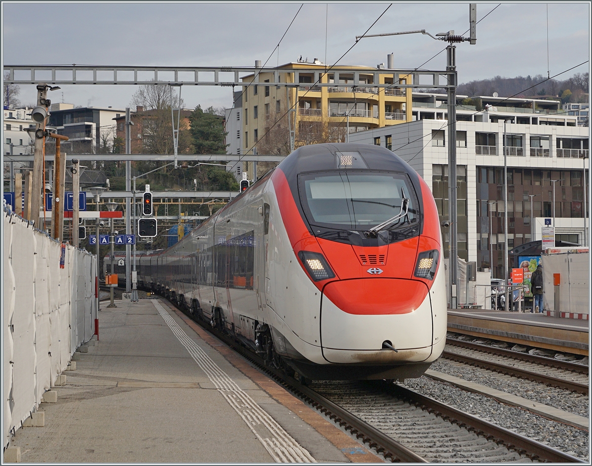 The SBB Giruno RABe 501 023 coming from Zürich is arriving at Lugano. 

13.03.2023