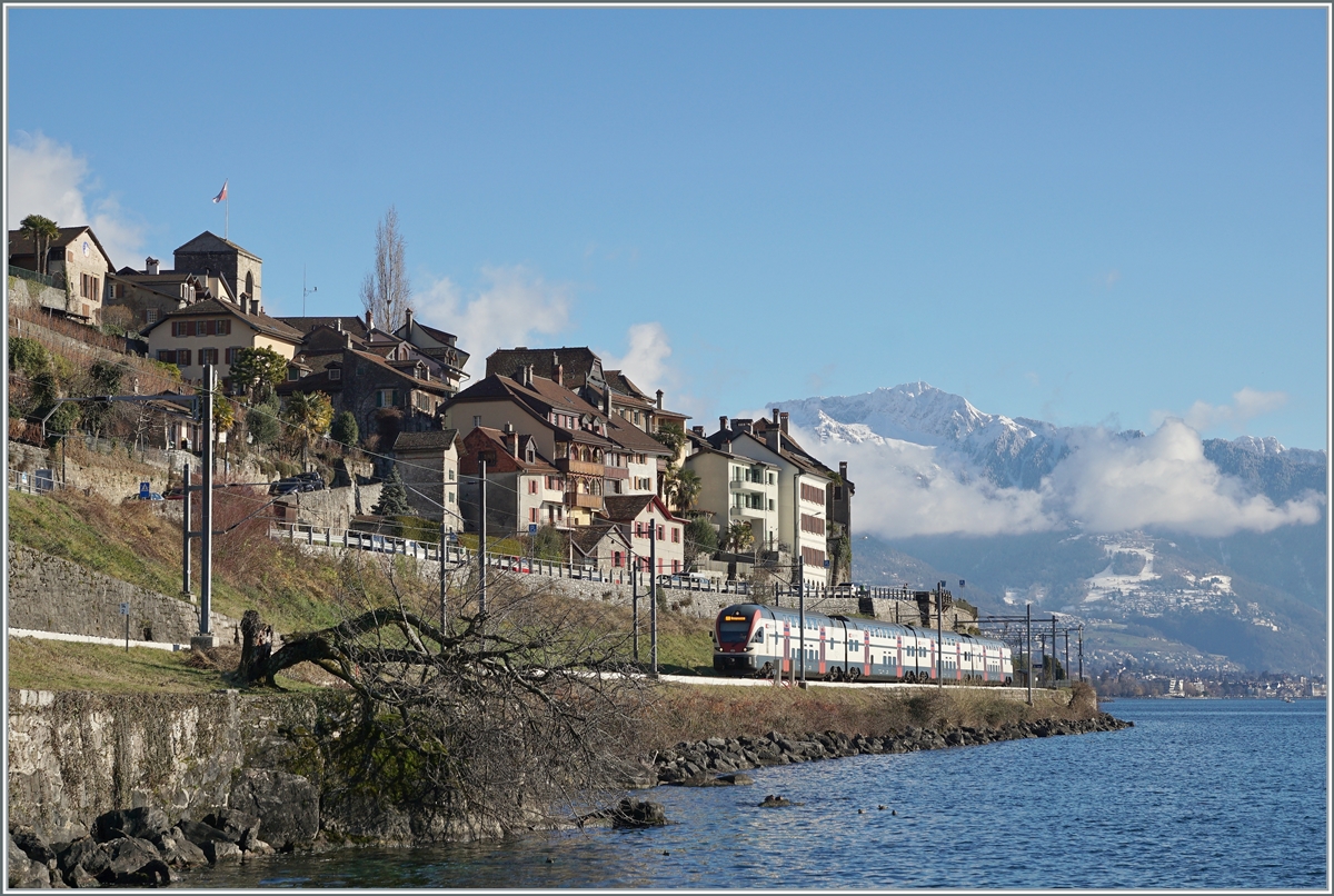 The SBB KISS RABe 511 112 on the way to Annemasse between St Saphorin and Rivaz.


11.01.2022