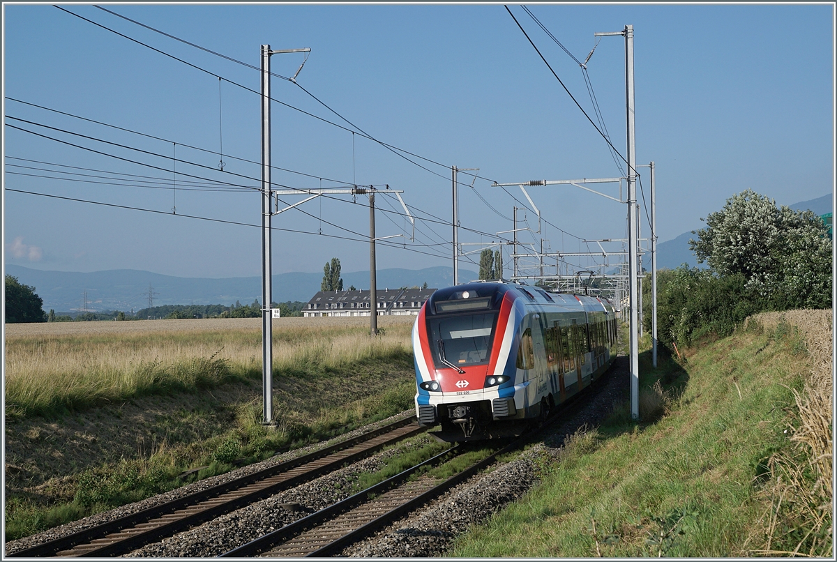 The SBB LEX RABe 522 226 on the wayfrom La Plaine to Geneva near Satigny by Bourdigny. 

19.07.2021
