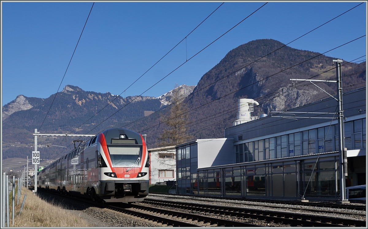 The SBB RABe 511 036 by Aigle on the way in direction of Lausanne. 

04.02.2024