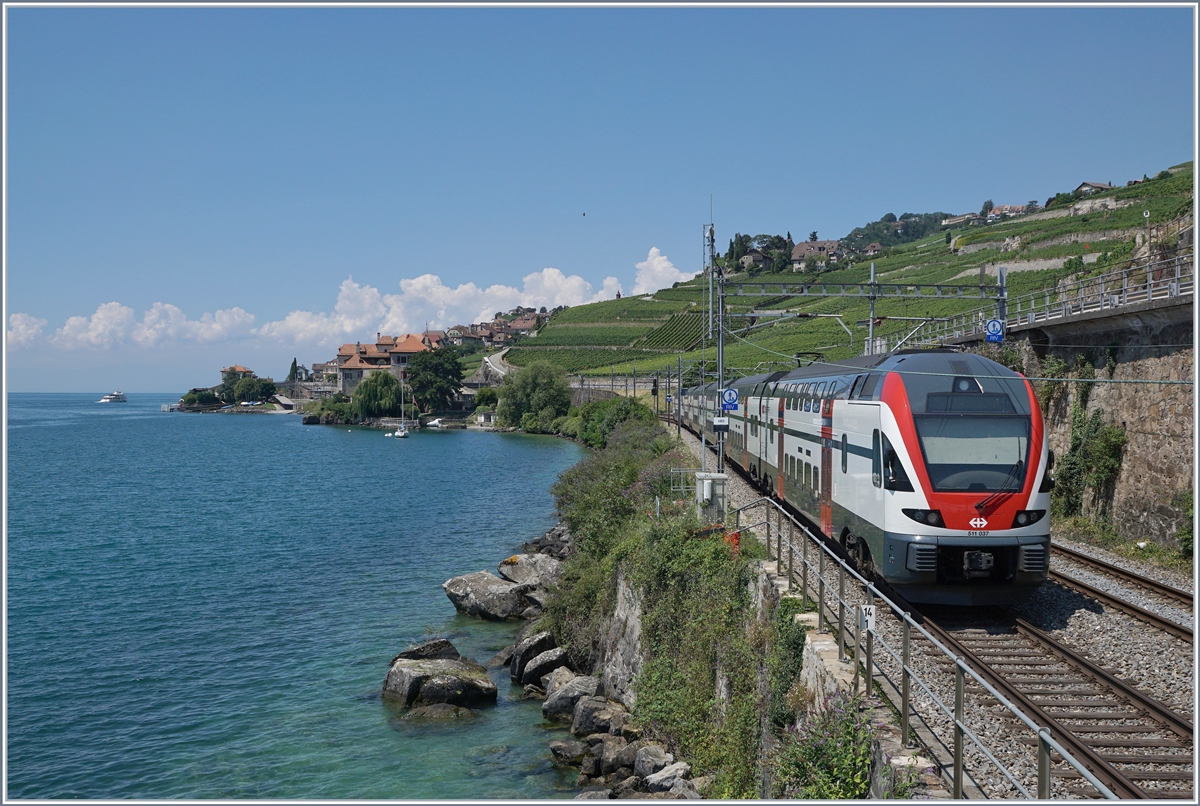 The SBB RABe 511 037 is on the way as RE Fribourg - Vevey - Genève near Rivaz. (Special Summer SBB Timetable). 
10.07.2018