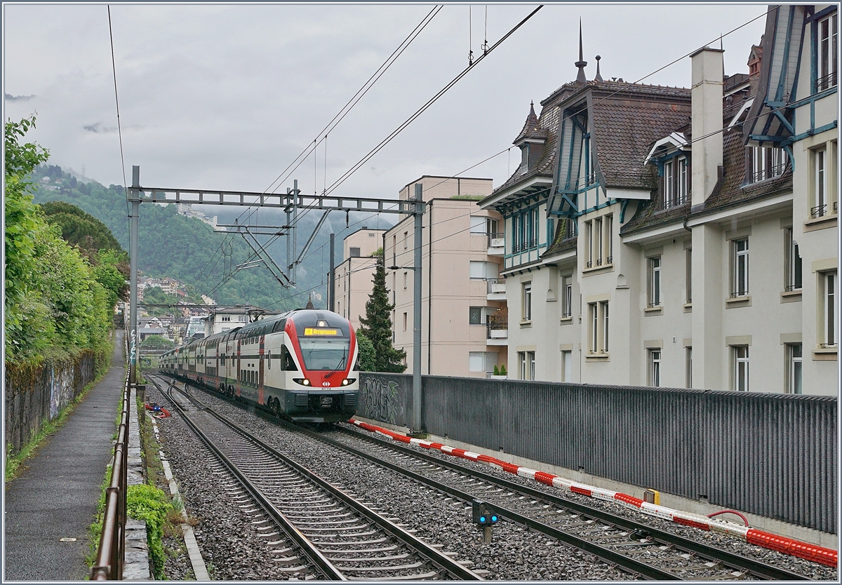 The SBB RABe 511 112 and 119 on the way to Geneva between Montreux and Clarens.

05.05.2020
