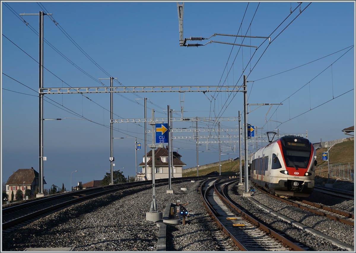 The SBB RABe 523 015 in Cully on the way to Aigle. 

16.02.2023